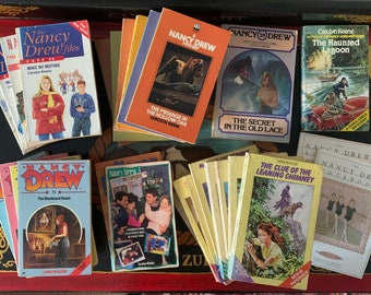 Nancy Drew paperback books. mystery stories written by Carolyn Keene