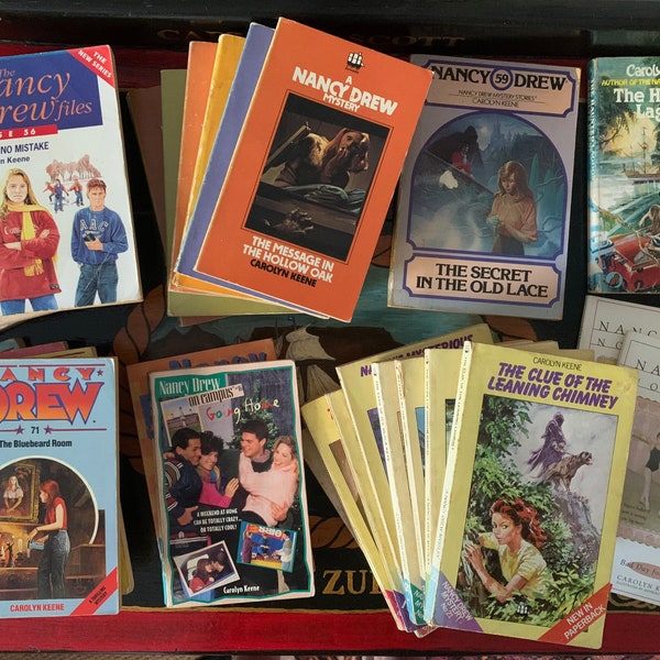 Nancy Drew paperback books. mystery stories written by Carolyn Keene