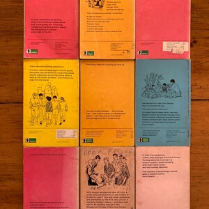 May include: A collection of six vintage paperback books with colorful covers featuring illustrations of children and animals. The books are titled "The Five's" and each book has a different adventure. The books are from the Green Knight series.