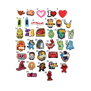 May include: A set of 35 colourful shoe charms featuring various characters and designs, including a heart, a fish, a minion, a care bear, an R2-D2, a Hogwarts house crest, a red car, a 'SUS' charm, an 'XOX' charm, and a 'PRIME' charm.