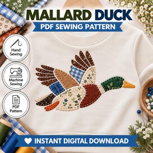 May include: A cream-colored sweatshirt featuring a mallard duck applique made from various patterned fabric patches. The text reads MALLARD DUCK PDF SEWING PATTERN and INSTANT DIGITAL DOWNLOAD, with icons for hand sewing, machine sewing, and PDF pattern.