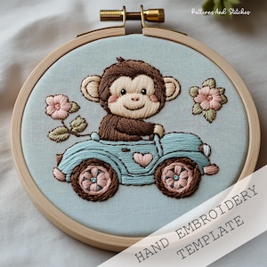 May include: A hand embroidery template featuring a cute cartoon monkey driving a blue car with pink flowers. The template is in a wooden embroidery hoop.