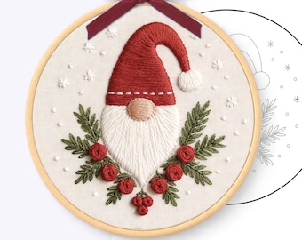 May include: A hand embroidery pattern in an 8 inch wooden hoop featuring a gnome with a red hat and white beard, surrounded by green pine sprigs and red berries. The text reads HAND EMBROIDERY PATTERN - PDF, HOOP 8 inch - 20 cm, and AI-rendered preview - Hand-drawn pattern.