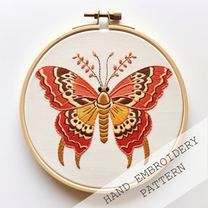 Esthetisch vlinderborduurpatroon, sierborduurwerk, grillig borduurpatroon, insectenborduurontwerp, fantasieborduurkunst