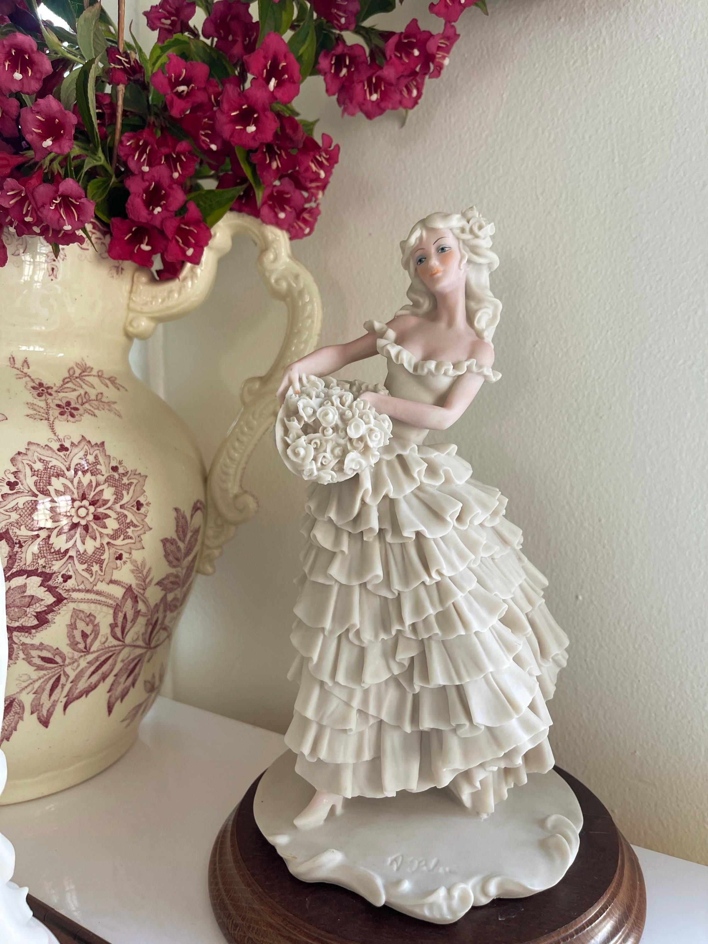 A Belcari Figurine - Etsy