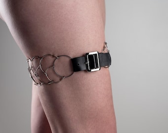 Thigh cilice, catholic penitential belt, metal and black leather, two rows