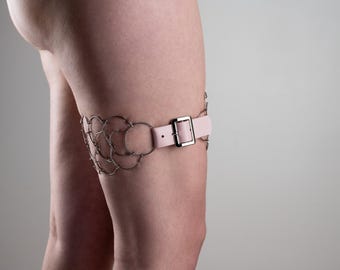 Thigh cilice, catholic penitential belt, metal and pink leather, three rows - nickel free
