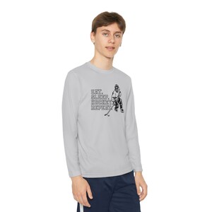 Eat. Sleep. Hockey. Repeat. Youth Long Sleeve Competitor Tee