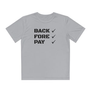 May include: A light gray t-shirt with the words "BACK", "FORE", and "PAY" printed in black, each followed by a checkmark. The shirt has short sleeves and a crew neck.