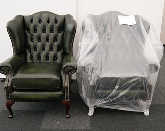 Chesterfield wing armchair antique green leather, made in our English workshop