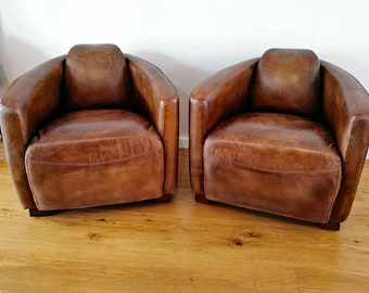 2 x Fauteuils Aviateur vintage cognac