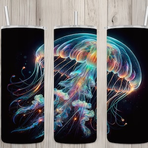 May include: A set of three stainless steel tumblers featuring a colourful, abstract jellyfish design. The jellyfish is rendered in shades of blue, purple, orange, and yellow, against a dark background.