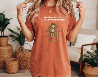 Comfort Colors Western Frog Shirt: Hold On Partner I'm Overstimulated Graphic Tee