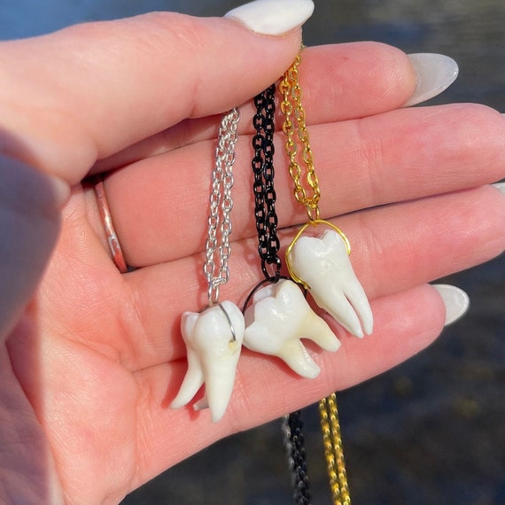 Details 157+ wisdom tooth necklace super hot songngunhatanh.edu.vn