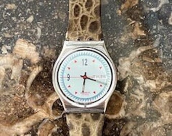 Reloj Swatch en funcionamiento 1991, "One Step" Resistente al agua de fabricación suiza con movimiento de segunda mano. Fácil de reemplazar la batería cuando llegue el momento