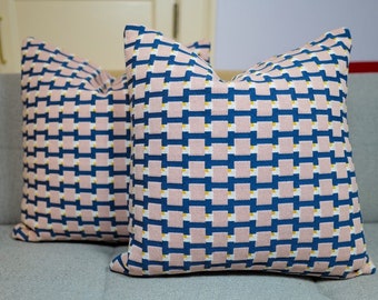 Par de bloques de diseño de almohadas de doble cara.