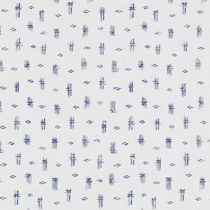 May include: White fabric with a repeating pattern of navy blue vertical and horizontal brushstrokes and small dashes. The design has a hand-drawn, textured appearance, creating a simple yet visually interesting textile.