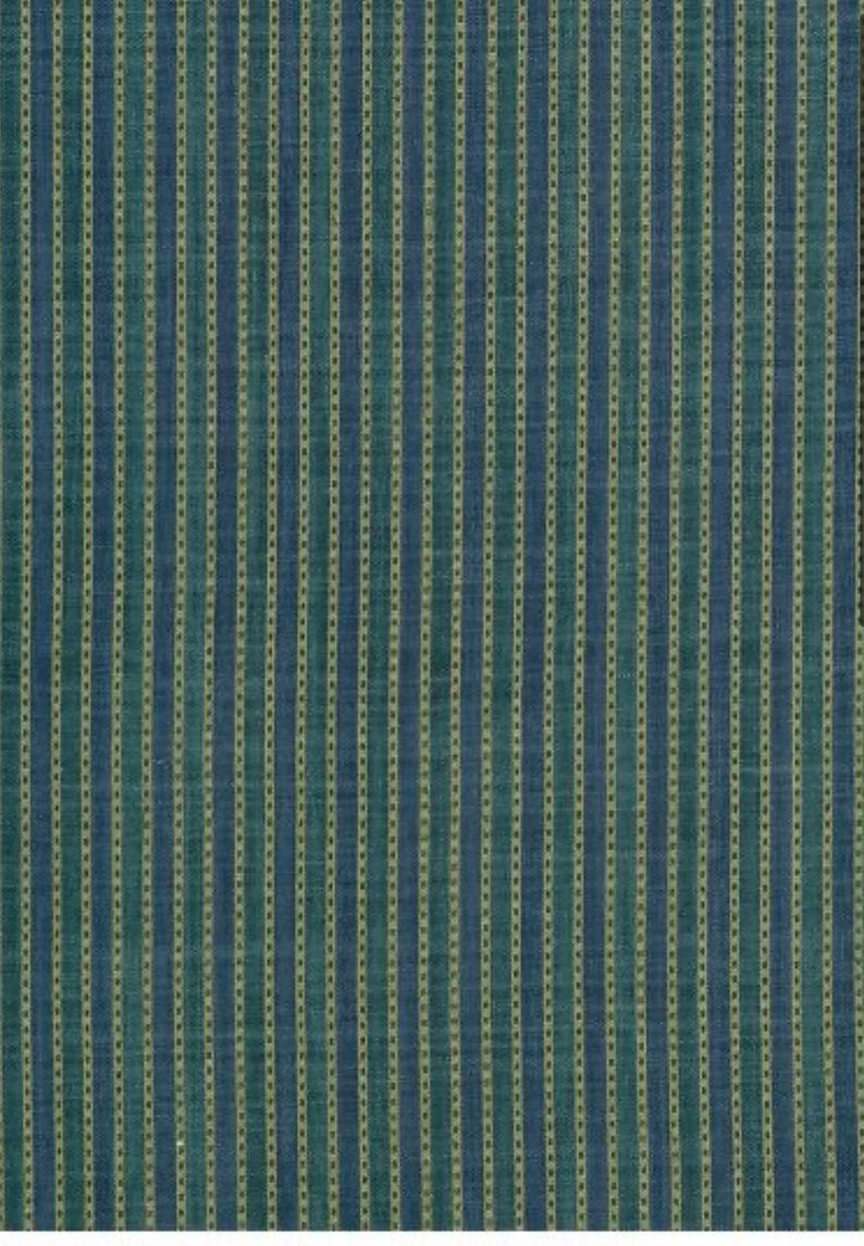 May include: A fabric with a vertical striped pattern. Alternating stripes of blue and teal green are separated by thin, dotted, light beige lines. The fabric has a slightly textured appearance, suggesting a woven material. The overall design is simple and classic.