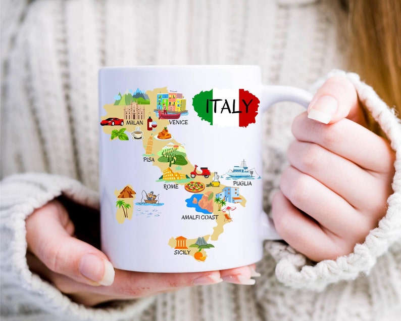 May include: White ceramic mug with a colorful illustration of a map of Italy, featuring major cities and landmarks like Milan, Venice, Pisa, Rome, Amalfi Coast, Sicily, and Puglia. The mug has the word "ITALY" in red, white, and green.