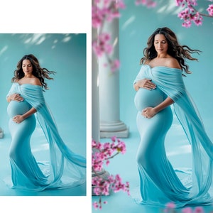 May include: A pregnant woman in a light blue maternity gown with a flowing chiffon cape, standing in front of a blue background with white columns. The woman is holding her belly and looking down.