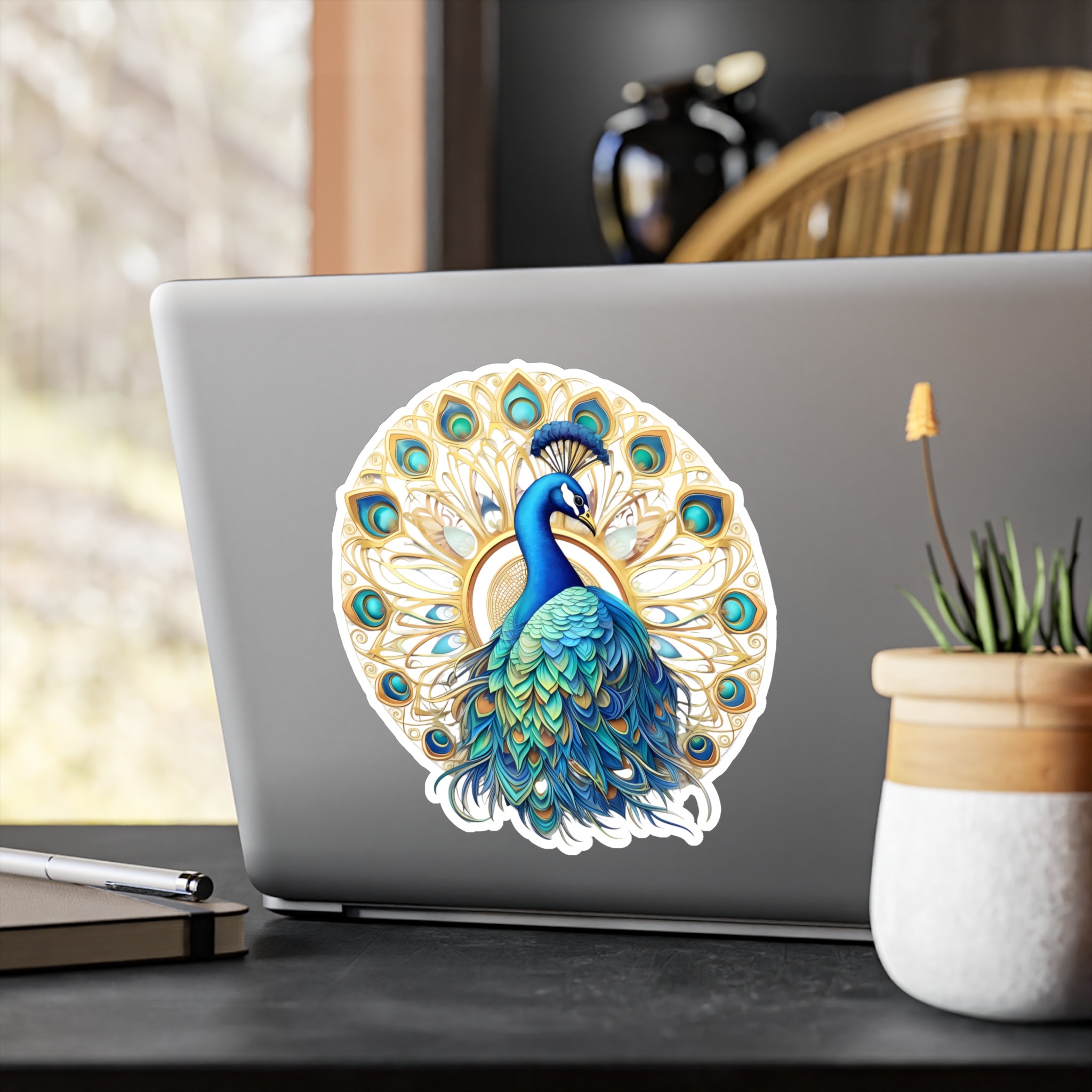 Peacock Mandala Vinyl Decal showing vibrant turquoise and blue colors on a laptop