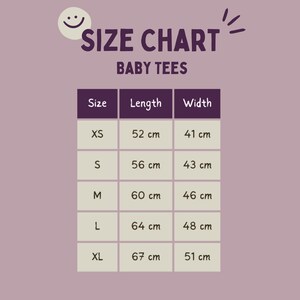 May include: Size chart for baby tees with measurements in centimeters. The chart shows sizes XS, S, M, L, and XL with corresponding length and width measurements.