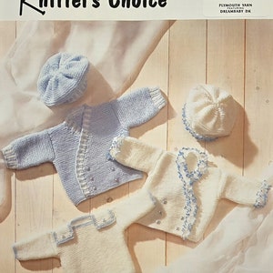 May include: Knitting pattern for a baby sweater and hat set. The pattern is called "Knitter's Choice" and is for sizes 12-18 inches (31-46 cm). The pattern is made with Plymouth Yarn Dreambaby DK.