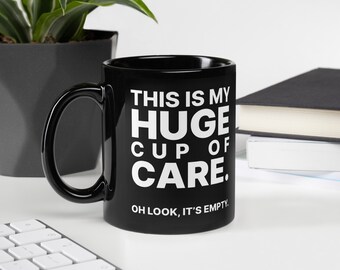Funny Black Ceramic Coffee Mug – "Huge Cup of Care" Sarcastic Gift