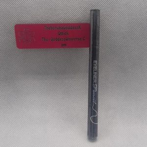 May include: Black eyeliner pen with the text "EYELINER" and "effect" printed on the side.