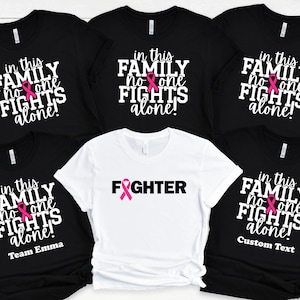 In This Family No Body Fights Alone Breast Cancer Support Shirt, Breast Cancer Fighter Shirt, Matching Cancer Support Group Shirt For Family