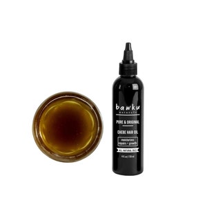 Chebe Hair Oil With Pure Chebe Powder From Chad. Contains Castor, Lavender And Chamomile Oils For Strengthening Retaining And Growth