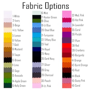 以下が含まれることがあります： 「Fabric Options」と題されたカラーチャートには、さまざまな色の46の生地見本が表示されています。各見本には番号と色名が付けられており、白からコーラルまであります。このチャートは、利用可能な生地の選択肢を示すように設計されています。
