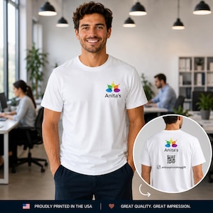 May include: A white t-shirt with a colourful floral logo and the text "Anita's" on the front. The back of the shirt also features the logo, a QR code, and the Instagram handle "anitasprintshopgift".