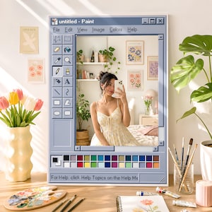 May include: A framed artwork depicting a woman taking a selfie, set within a retro computer interface. The image includes a palette, paint tubes, and a vase of tulips. The text "untitled - Paint" is visible at the top of the frame.