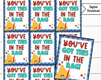 May include: A sheet of digital download cards with the text "YOU'VE GOT THIS IN THE BAG!" in red and teal. Each card features a smiling tortilla chip with a red pencil and star accents. The cards have a blue and white striped border.