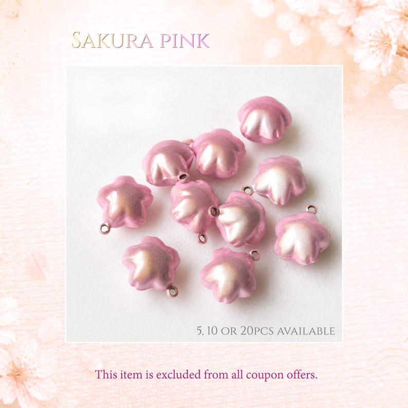 May include: A collection of small, star-shaped charms in a pearlescent sakura pink finish. Each charm features a smooth, rounded surface and a small metal loop at the top for attachment. The text SAKURA PINK, 5, 10 OR 20PCS AVAILABLE is visible.