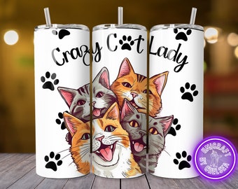 May include: White tumbler with a design featuring the text "Crazy Cat Lady" and illustrations of several cats. The cats are in shades of orange, gray, and white. Black paw prints are scattered around the tumbler.