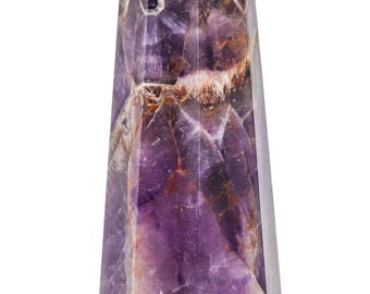 May include: A tall, faceted amethyst crystal point. The polished stone displays a range of purple hues, with areas of lighter lavender and darker, almost black, tones. The crystal has a natural, textured appearance, with visible internal patterns.