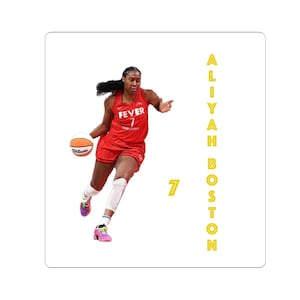 May include: A woman in a red Fever basketball uniform with the number 7 dribbles a basketball. The word "FEVER" is on the jersey. The name "ALIYAH BOSTON" is written vertically in yellow letters. A Wilson basketball is in the image.