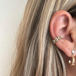 The Harmony Ear Cuff in Plated 18ct Gold with White Cubic Zirconia Stones