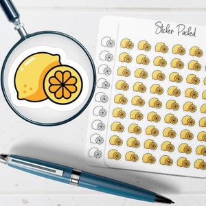 May include: A sheet of lemon stickers with the text "Sticker Packed". The stickers feature a whole lemon and a lemon slice. A magnifying glass shows a close-up of a lemon sticker. A blue pen is also in the image.