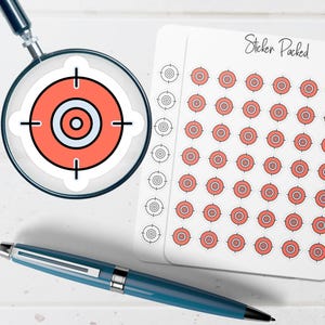 May include: A sheet of stickers with a target design, featuring a red and white bullseye. A magnifying glass focuses on a single target sticker. A blue pen is also in the image. The text "Sticker Packed" is written on the sticker sheet.