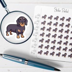 May include: A sheet of dachshund stickers with the text "Sticker Packed". The stickers feature a cartoon illustration of a black and tan dachshund. A magnifying glass with a single dachshund sticker and a blue pen are also in the image.