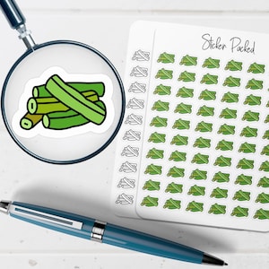 May include: A sticker sheet with multiple okra stickers and a single sticker of okra under a magnifying glass. The okra stickers are green with a white outline. The text "Sticker Packed" is written on the sticker sheet.