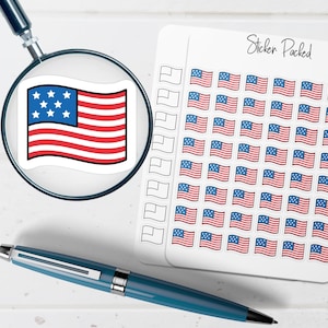 May include: A sticker sheet with multiple small American flag stickers. A single flag sticker is magnified by a magnifying glass. A blue pen is in the foreground. The words "Sticker Packed" are written on the sticker sheet.