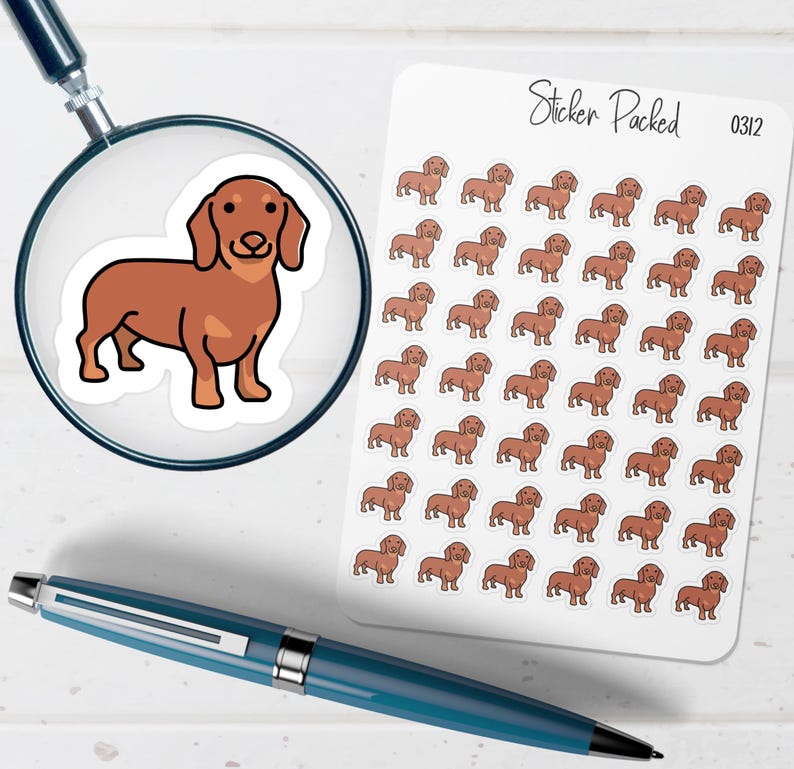 May include: A sheet of dachshund stickers featuring a brown dog illustration. The stickers are on a white background with the text "Sticker Packed" and the number "0312". A magnifying glass and a blue pen are also in the image.