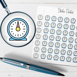 May include: A sheet of stickers featuring a blue and white timer design, with a yellow center and a pink hand. The stickers are next to a magnifying glass and a blue pen. The text "Sticker Packed" is visible.