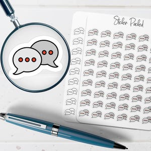 May include: A sheet of stickers featuring speech bubbles with three dots, and a sticker with two speech bubbles with three dots. The stickers are gray with black outlines and red dots. A blue pen and a magnifying glass are also in the image.