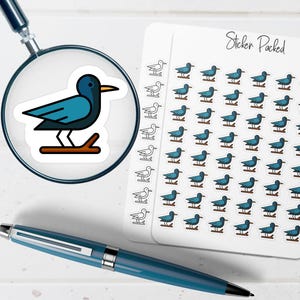 May include: A sheet of stickers with a repeating pattern of a blue bird perched on a branch. The stickers are on a white background with the words "Sticker Packed" in cursive. A magnifying glass and a blue pen are also in the image.