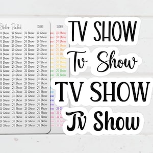 May include: A collection of white stickers with the text "TV SHOW" in various fonts. Some stickers are in a script font, while others are in a bold, sans-serif font. A sheet of smaller stickers repeats the phrase.